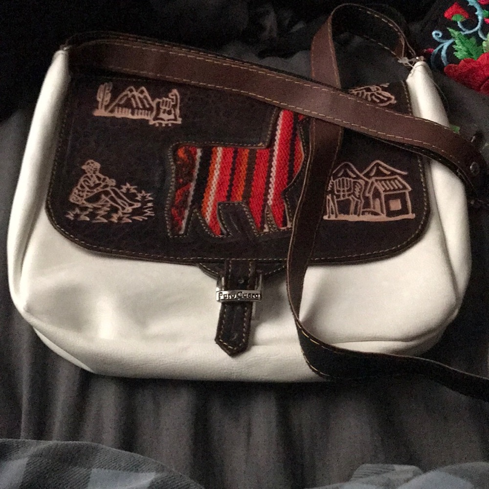 White and brown purse